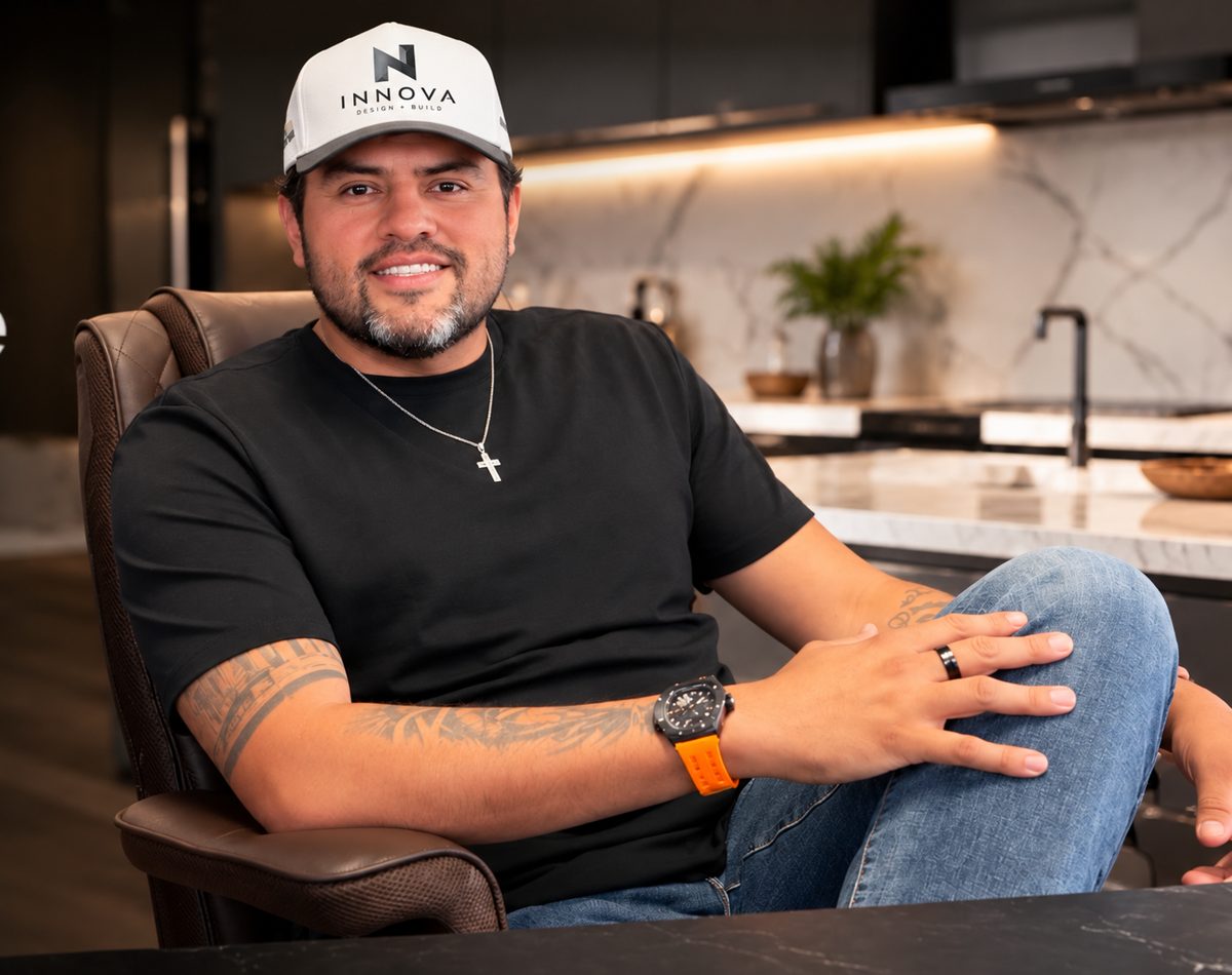 Miguel, owner of Innova Design + Build, in a finished kitchen